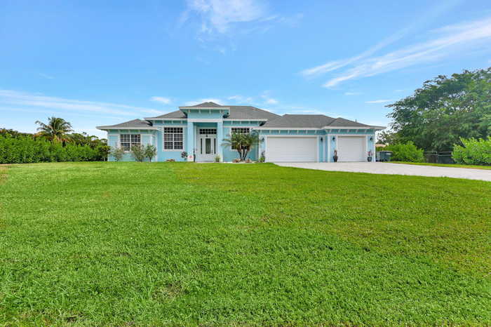 photo 2: 12179 Citrus Grove Boulevard, The Acreage FL 33412