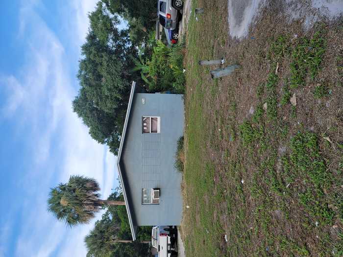 photo 1: 406 Decordre Court, Fort Pierce FL 34950