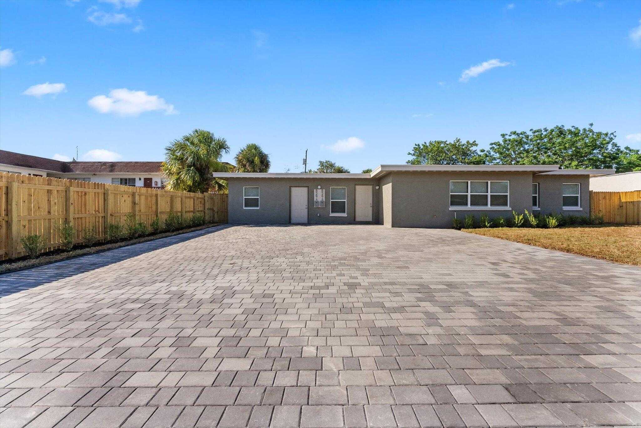 photo 1: 829 Bayberry Drive, Lake Park FL 33403