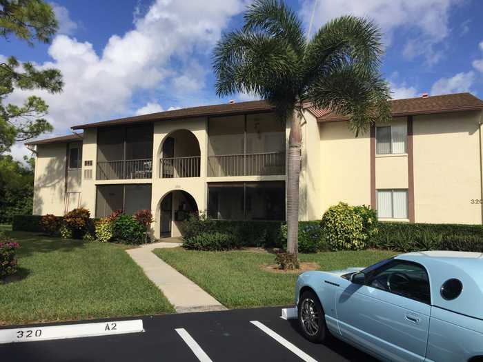 photo 1: 320 Knotty Pine Circle Unit C-2, Greenacres FL 33463