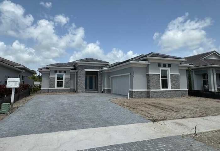 photo 1: 9967 Seagrass Way, Palm Beach Gardens FL 33412