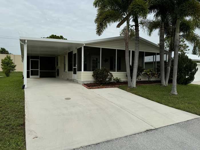 photo 1: 6747 Dulce Real Avenue Avenue, Fort Pierce FL 34951