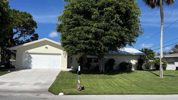 photo 1: 9801 Dahlia Avenue, Palm Beach Gardens FL 33410