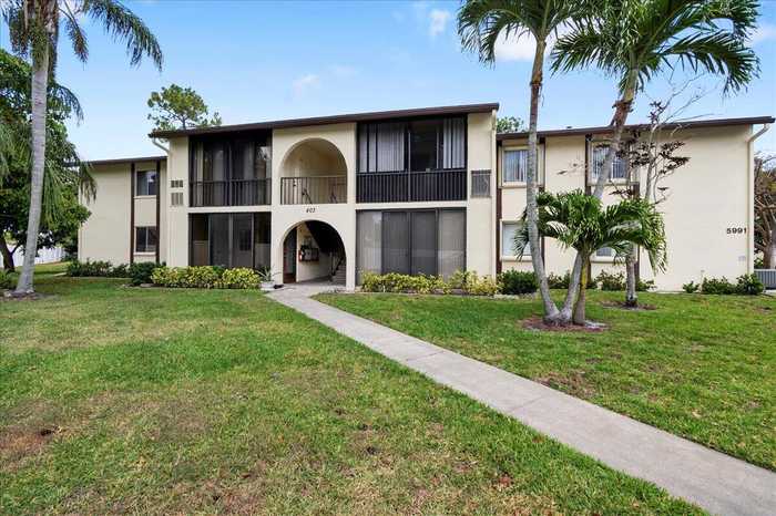 photo 1: 5991 Pine Cone Court Unit A-1, Greenacres FL 33463