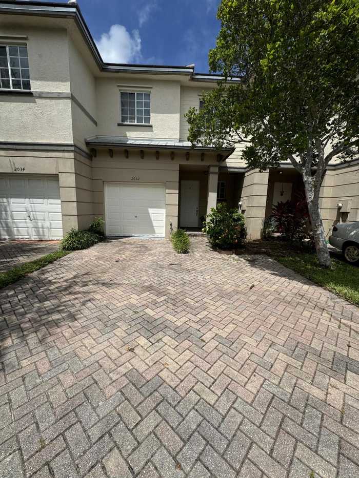 photo 1: 2032 Marsh Harbor Drive, Riviera Beach FL 33404