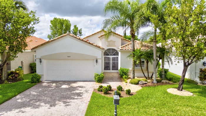 photo 1: 9839 Torino Drive, Lake Worth FL 33467