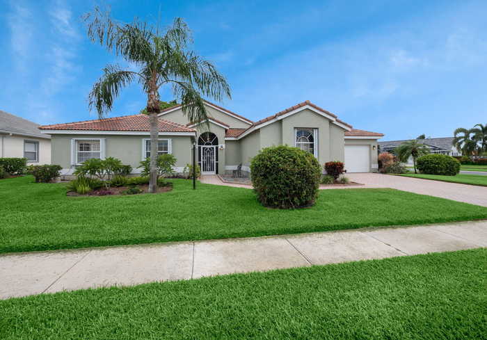 photo 1: 8719 Grassy Isle Trail, Lake Worth FL 33467