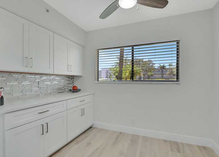 photo 2: 15365 Lakes Of Delray Boulevard Unit 105, Delray Beach FL 33484