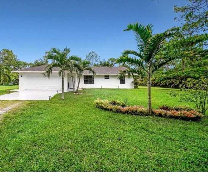 photo 1: 12629 83rd Lane, The Acreage FL 33470