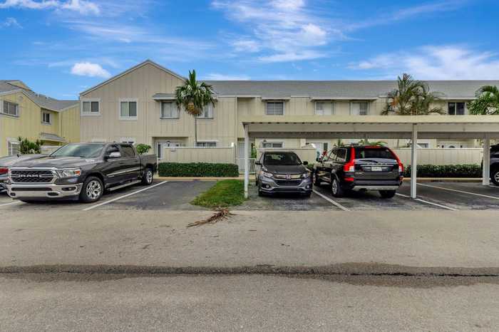 photo 1: 6214 Riverwalk Lane Unit 6, Jupiter FL 33458