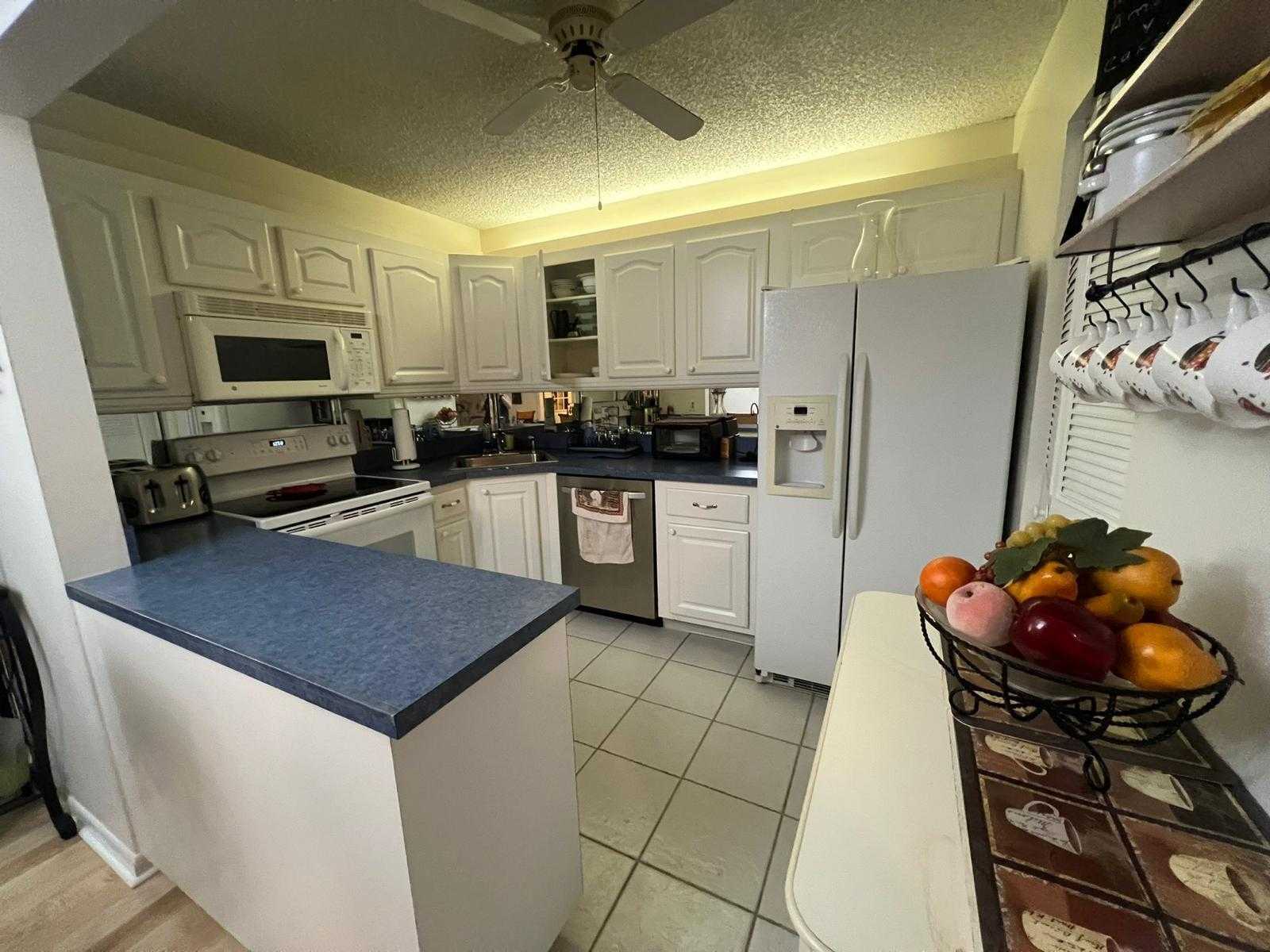 photo 1: 302 Knotty Pine Circle Unit D-1, Greenacres FL 33463