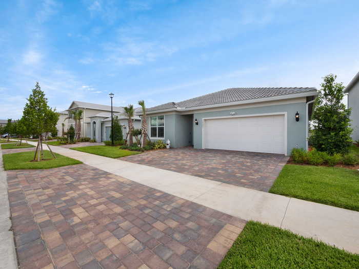 photo 1: 10621 Morning Glory Drive, Port Saint Lucie FL 34987