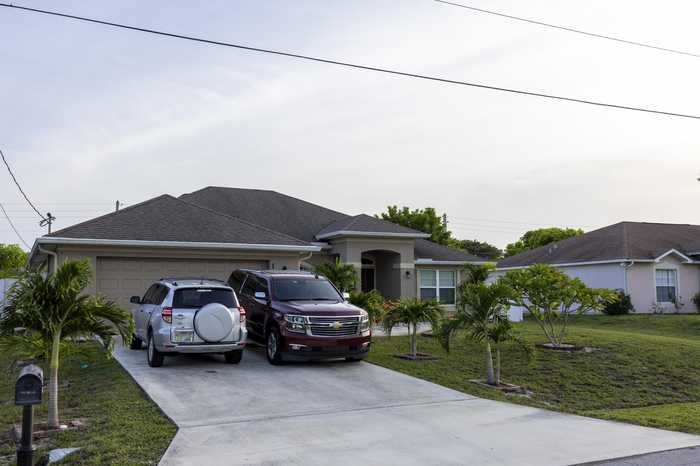 photo 1: 180 Amesbury Avenue, Port Saint Lucie FL 34953