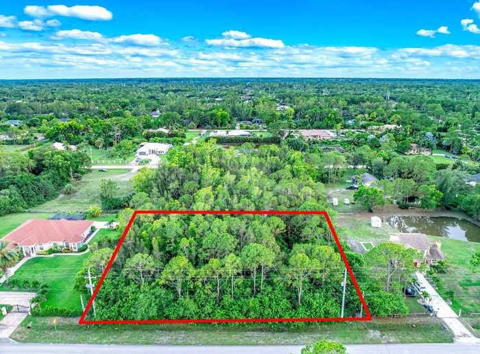 photo 1: 14370 Temple Boulevard, The Acreage FL 33470