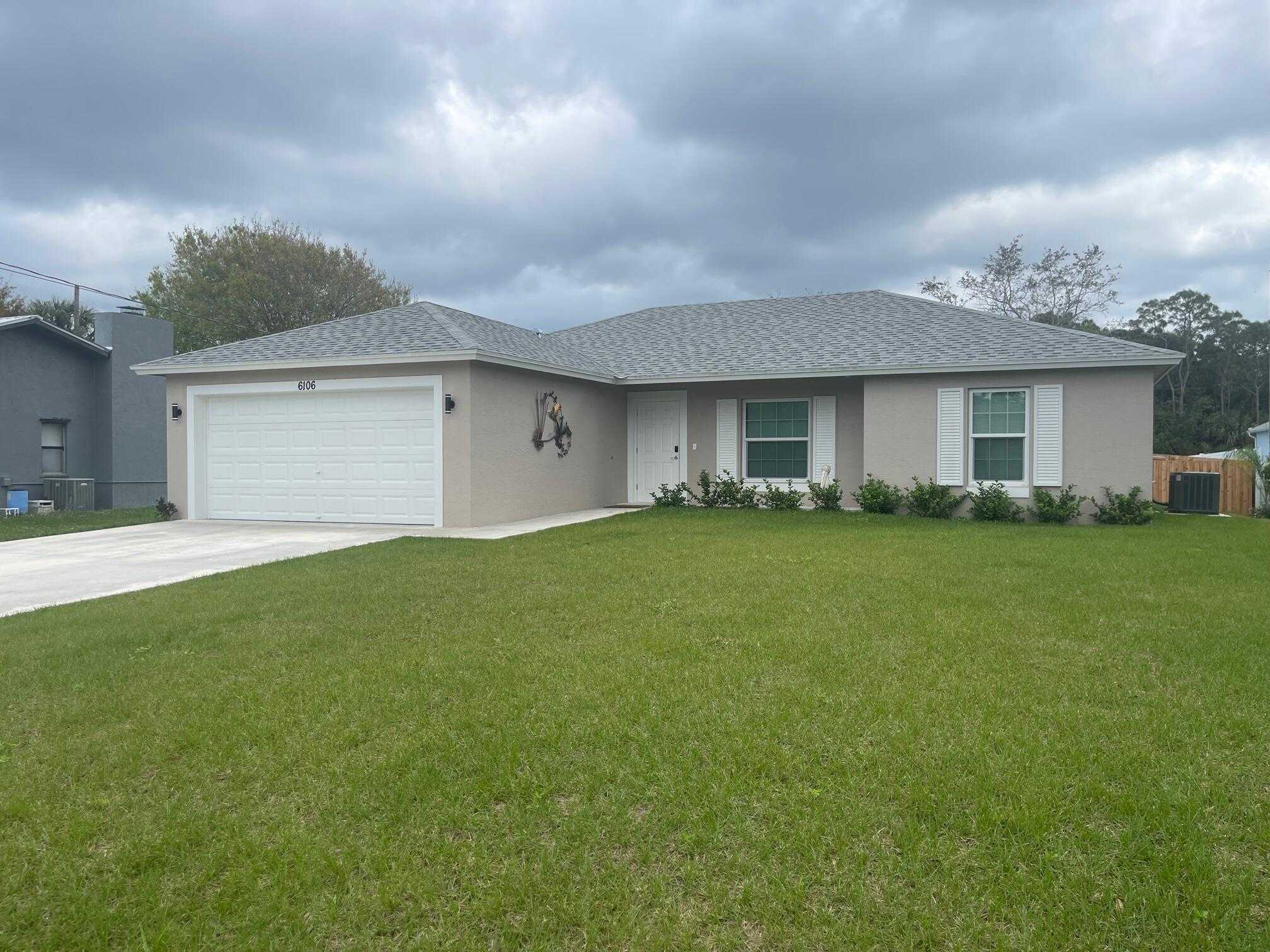 photo 1: 6106 Bamboo Drive, Fort Pierce FL 34982