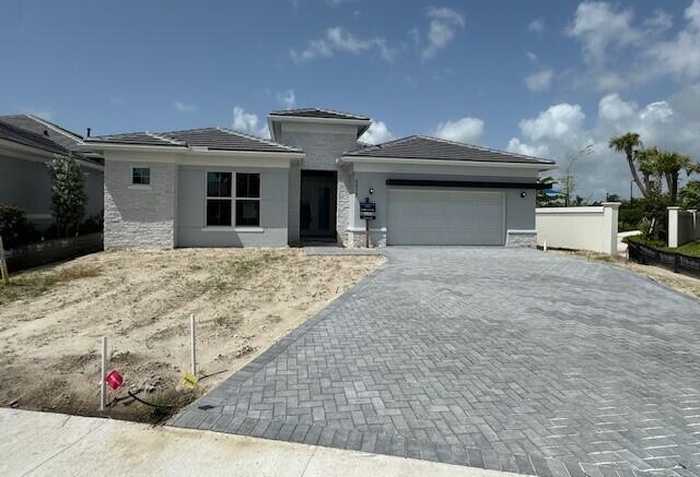 photo 1: 9953 Seagrass Way, Palm Beach Gardens FL 33412