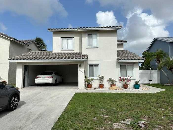 photo 1: 5656 Strawberry Lakes Circle, Lake Worth FL 33463