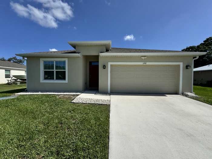 photo 1: 1742 Whipple Avenue, Port Saint Lucie FL 34953