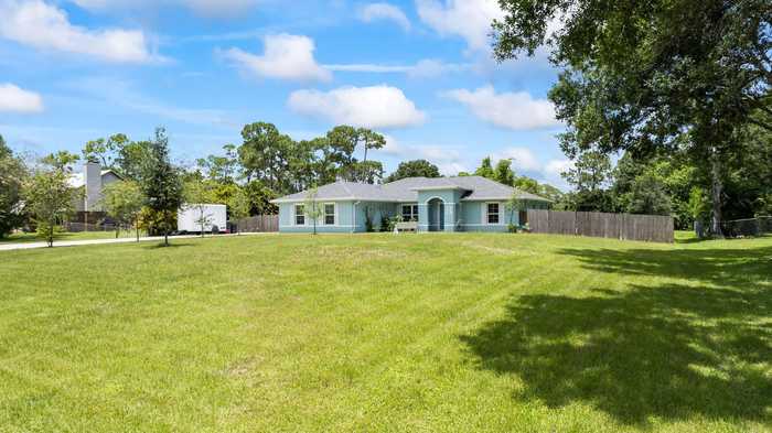 photo 1: 8682 Lonesome Pine Trail, Fort Pierce FL 34945