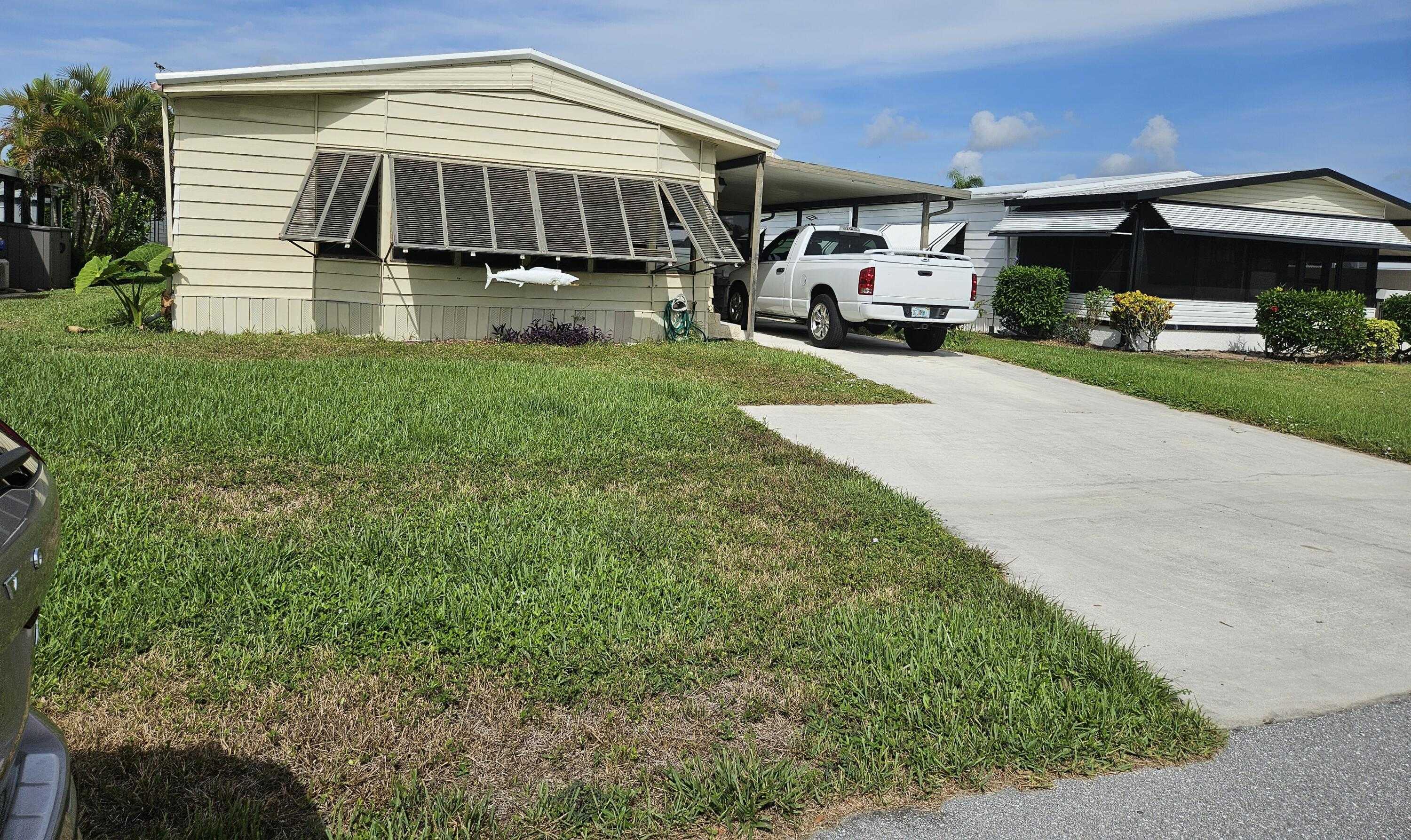 photo 2: 7870 Shenandoah Drive, Hobe Sound FL 33455