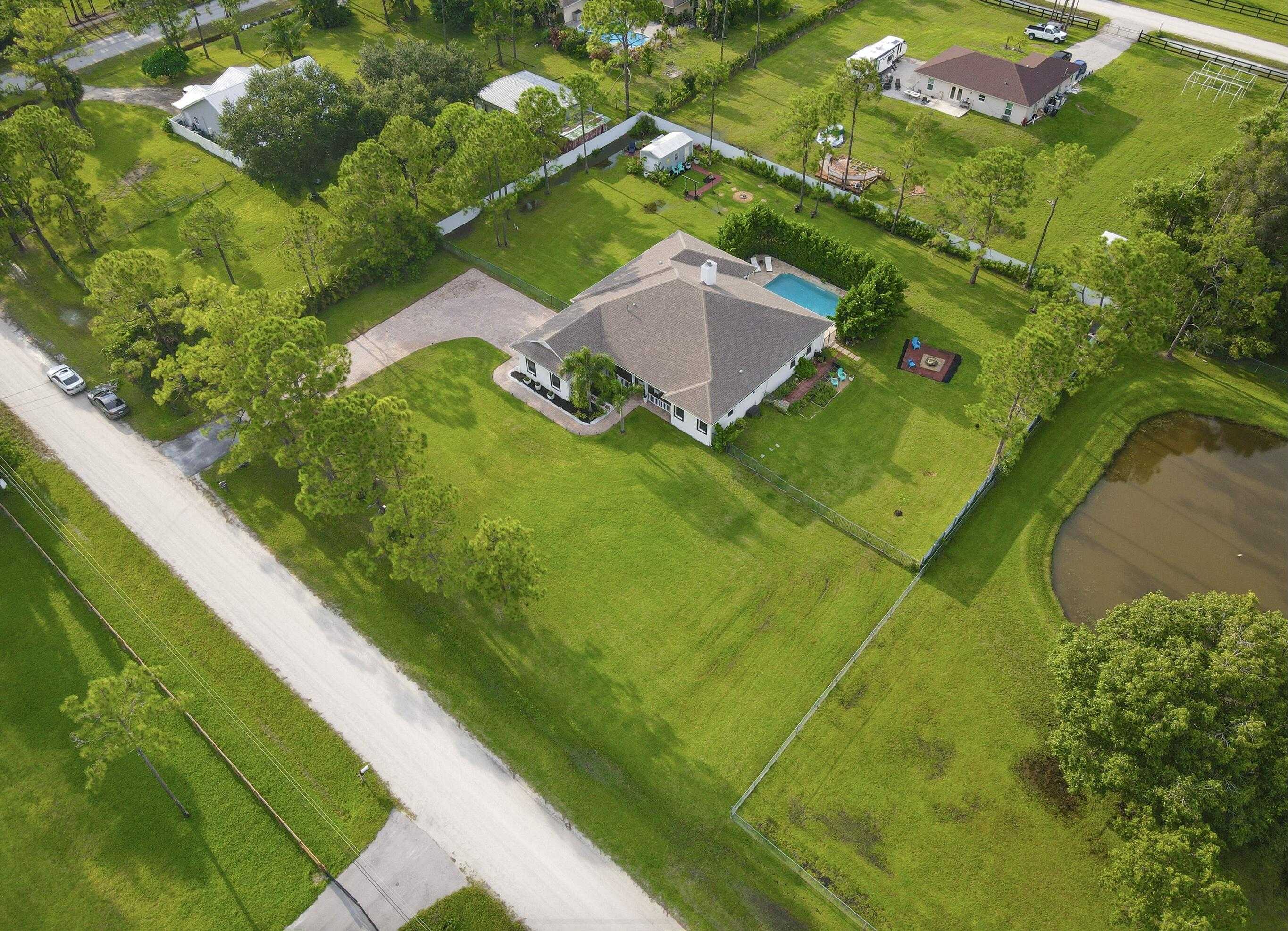 photo 2: 17441 77th Lane, The Acreage FL 33470