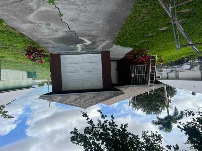 photo 1: 135 9th Avenue, South Bay FL 33493