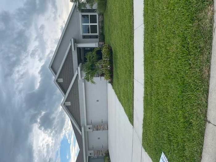 photo 1: 5595 Lugo Street, Fort Pierce FL 34951