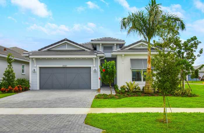 photo 1: 10010 Driftwood Way, Palm Beach Gardens FL 33412