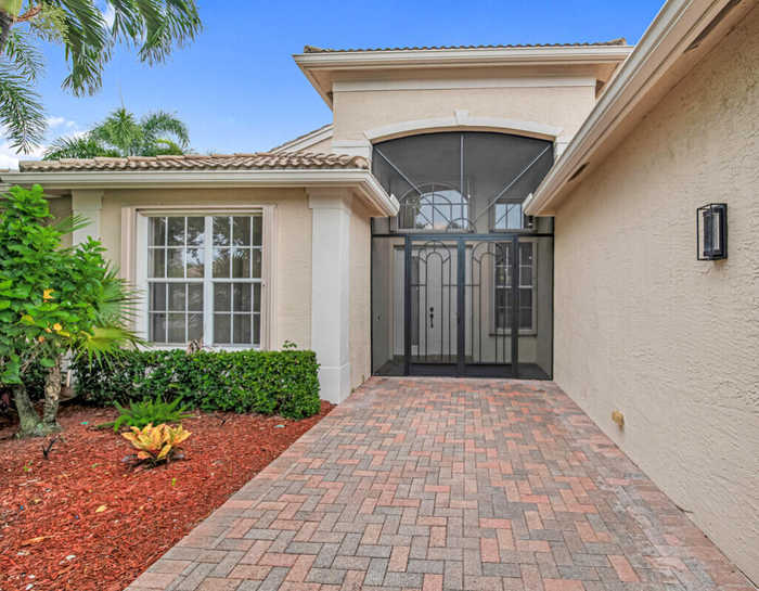 photo 1: 8682 Tierra Lago Cove, Lake Worth FL 33467