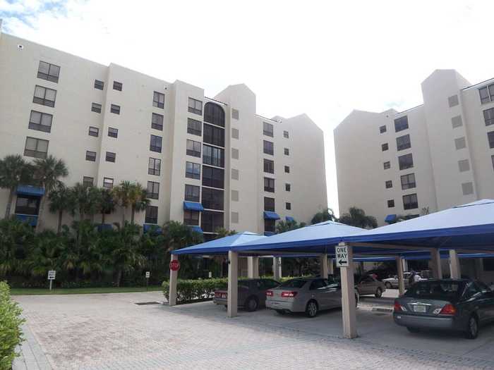 photo 1: 7580 Regency Lake Drive Unit 402, Boca Raton FL 33433