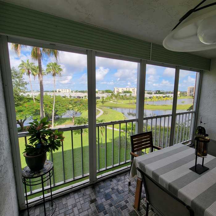 photo 1: 14623 Bonaire Blvd Unit 409, Delray Beach FL 33446