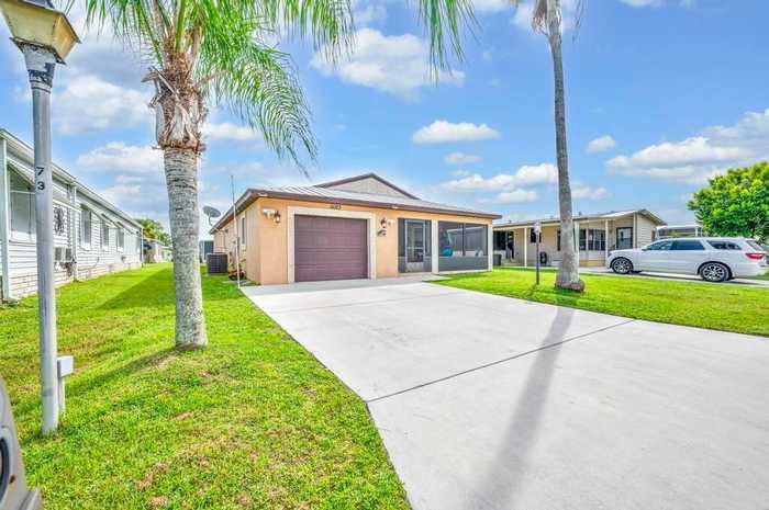 photo 1: 14163 Zorzal Avenue, Fort Pierce FL 34951