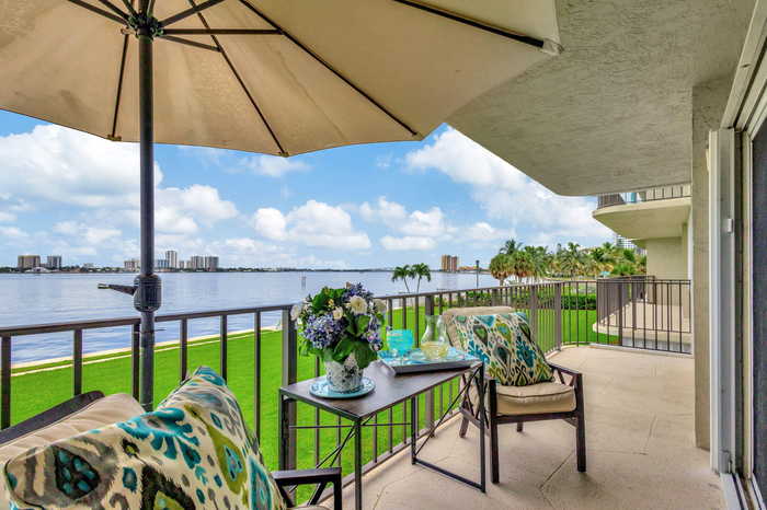 photo 1: 801 Lake Shore Drive Unit 206, Lake Park FL 33403