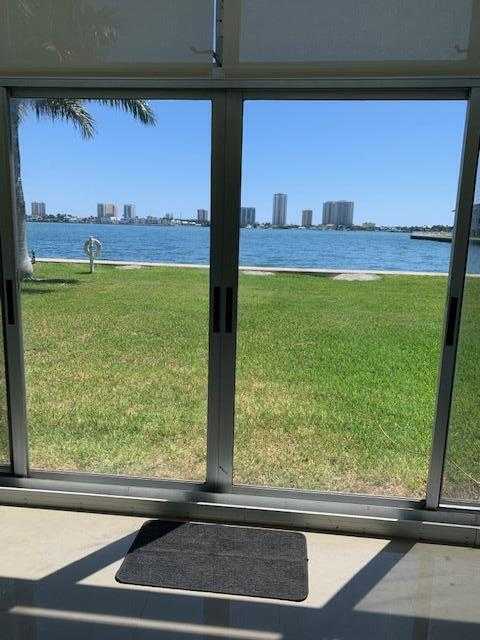 photo 1: 2936 Lake Shore Drive Unit 101, Riviera Beach FL 33404