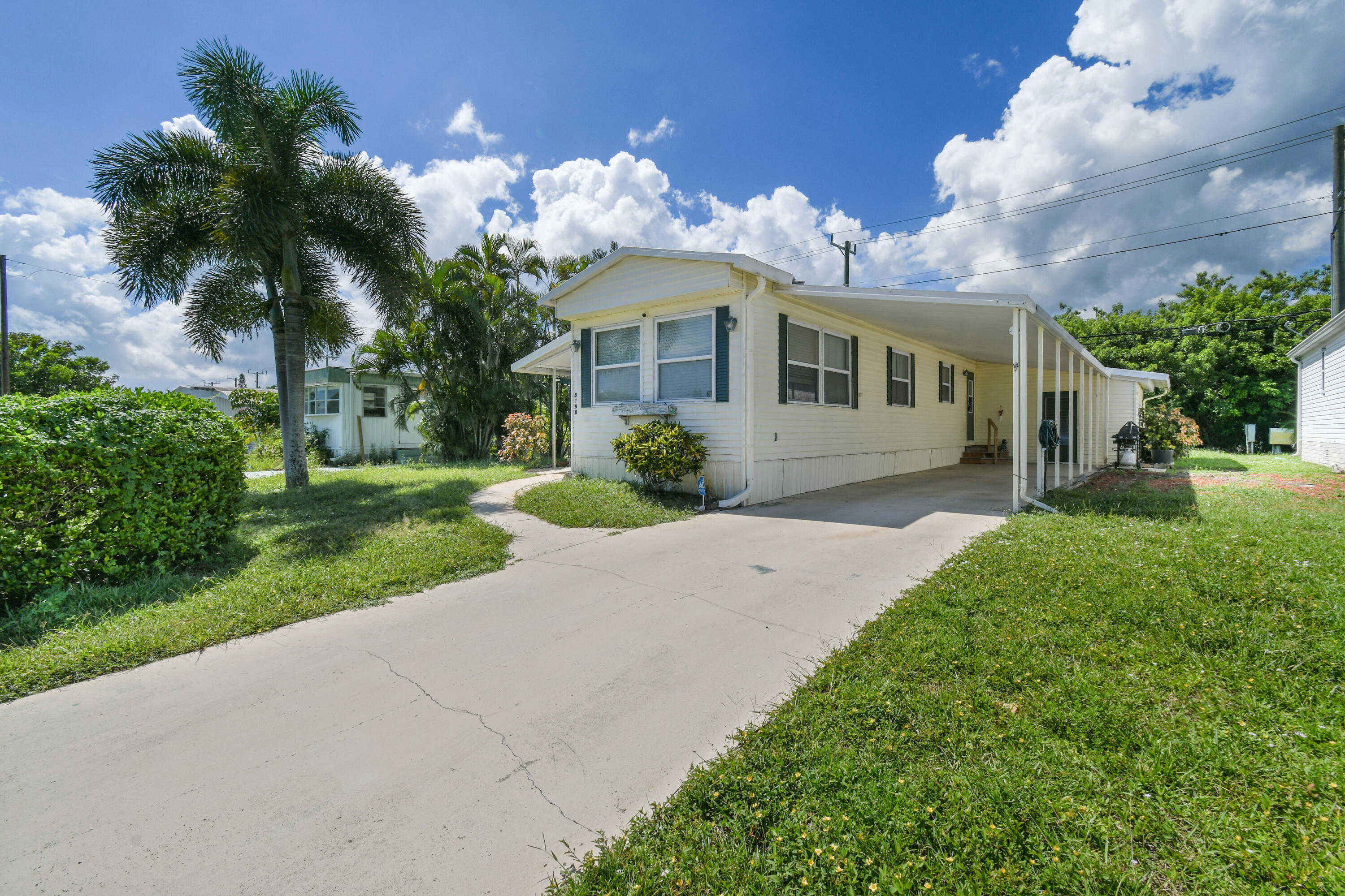 photo 1: 8188 Swan Avenue, Hobe Sound FL 33455