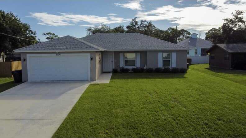 photo 1: 6106 Bamboo Drive, Fort Pierce FL 34982