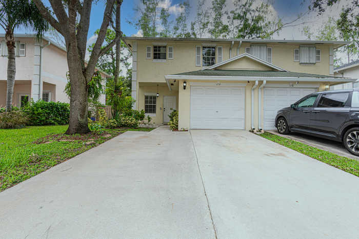 photo 1: 116 Baldwin Boulevard, Greenacres FL 33463