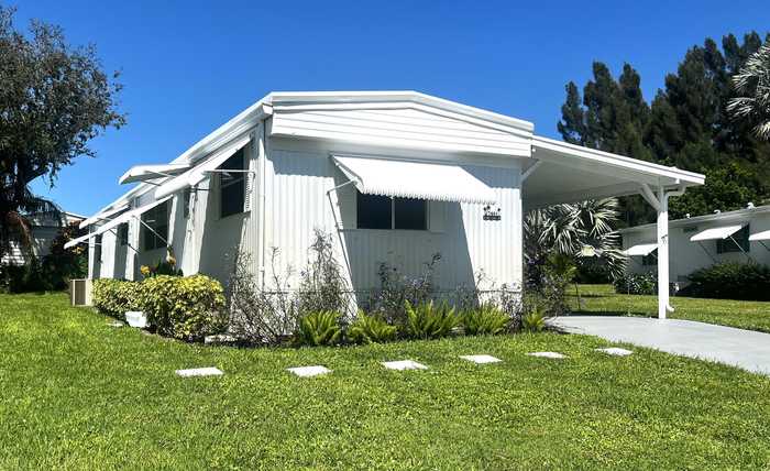 photo 1: 7981 Homestead Avenue, Hobe Sound FL 33455