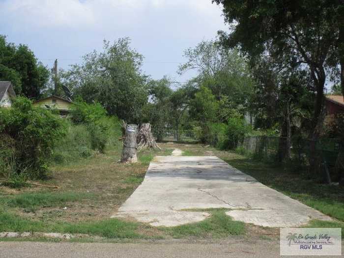 photo 1: 565 Corral St, San Benito TX 78586