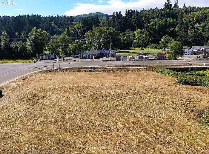 photo 7: Hwy 30 and Van St., Clatskanie OR 97016