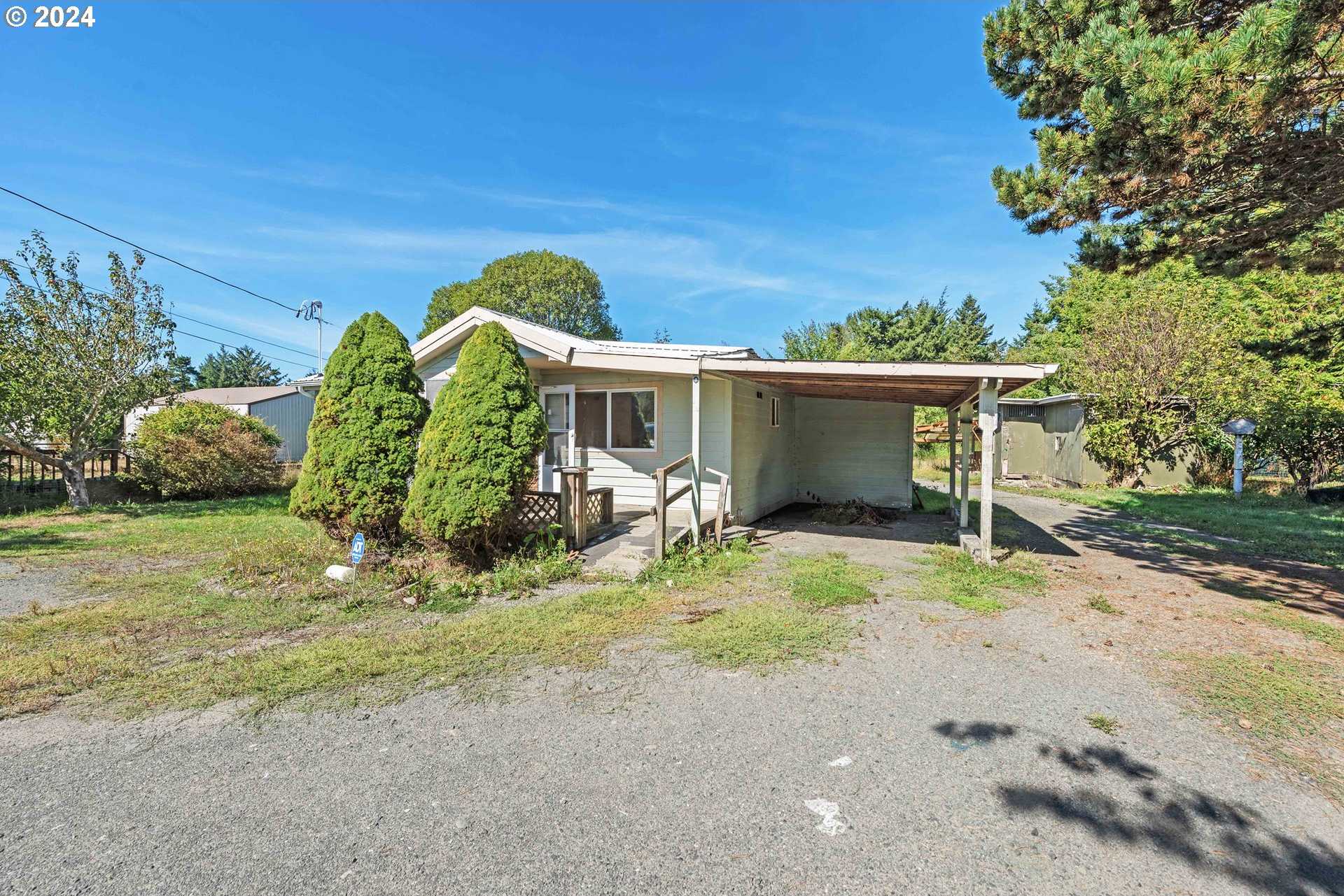 photo 1: 90853 TRAVIS LN, Coos Bay OR 97420