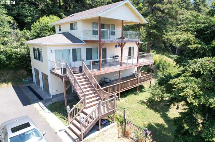 photo 1: 94244 10TH ST, Gold Beach OR 97444