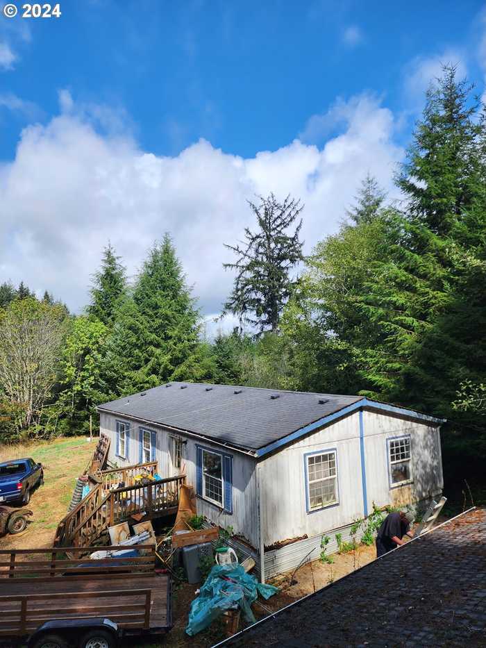 photo 1: 91788 ALDERWOOD LN, Coos Bay OR 97420