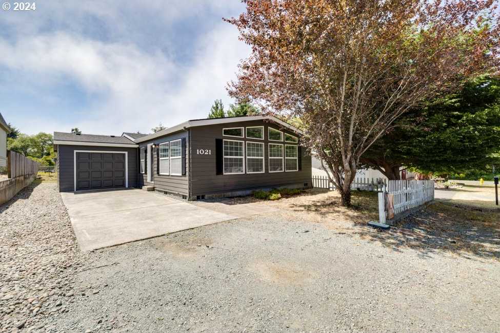 photo 1: 1021 NE 13TH AVE, Rockaway Beach OR 97136