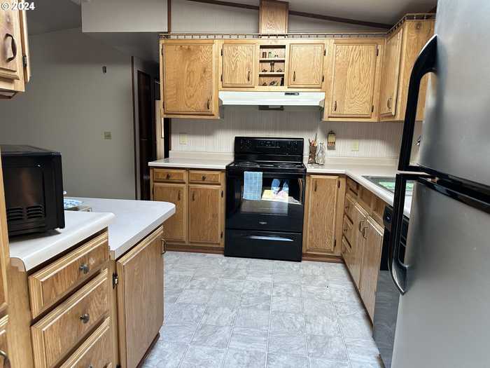 photo 2: 16063 DRIFTWOOD LN Unit 60, Brookings OR 97415