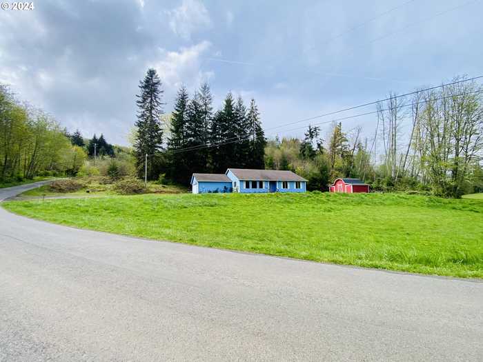 photo 1: 18401 JOHNSON RD, Clatskanie OR 97016