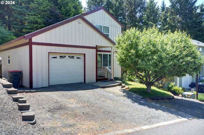 photo 1: 421 ELK CREEK RD, Cannon Beach OR 97110