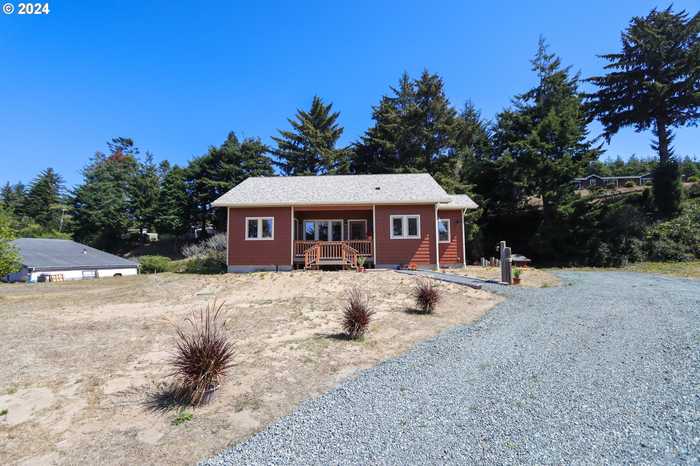 photo 1: 1310 Riverside DR NE, Bandon OR 97411