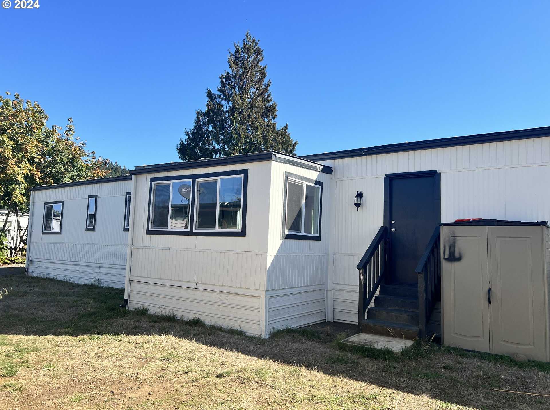 photo 1: 10701 SE HIGHWAY 212 Unit J3, Clackamas OR 97015