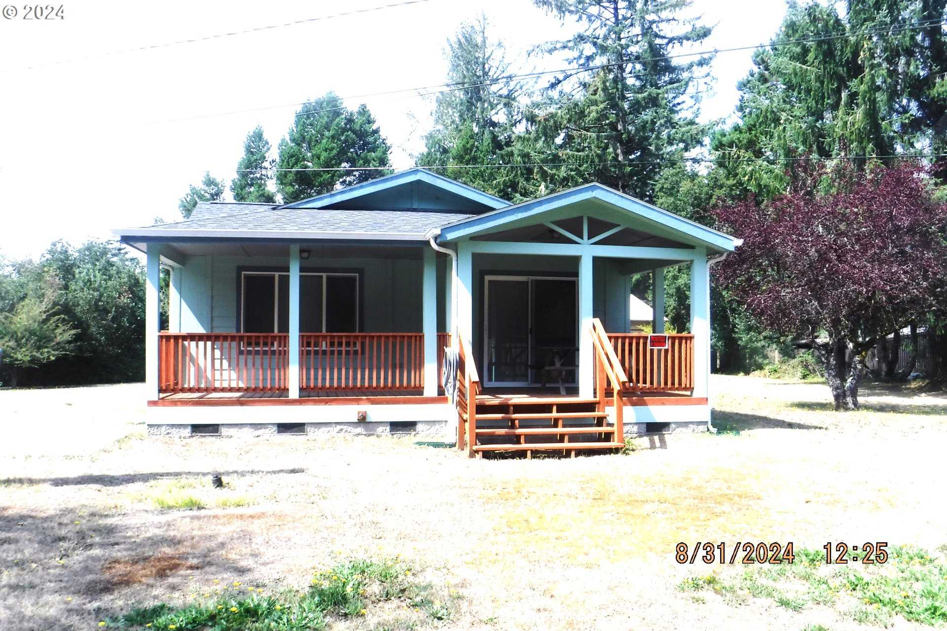 photo 1: 69712 WILDWOOD RD, North Bend OR 97459